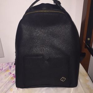 A Medium Sized Black Samsonite Bag